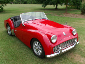 photo of a read 1960 Triumph TR3 car