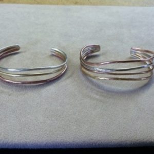 photo of two wire cuff bracelets