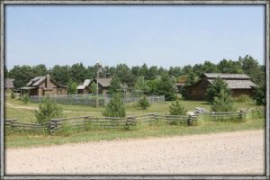 photo of an old acreage with barns on it