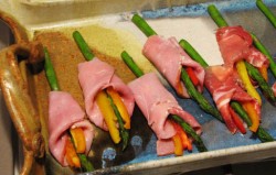 photo of asparagus and bell peppers wrapped in ham