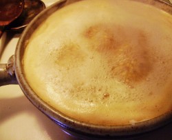photo of a saucepan with broth in it