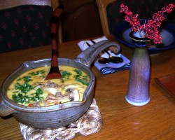 photo of soup in a ceramic saucepan