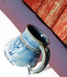 photo of a blue ceramic mug