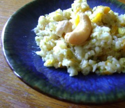 photo of onion rice pilaf on a blue plate