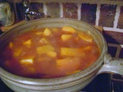 photo of orange squash soup in a cazeula