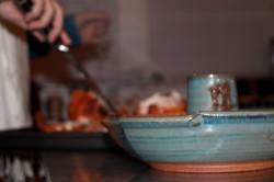 photo of a blue ceramic chicken baker