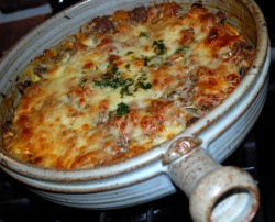 photo of baked lasagna in a cazuela