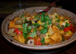 Photo of colorful veggies and meat in a tagine