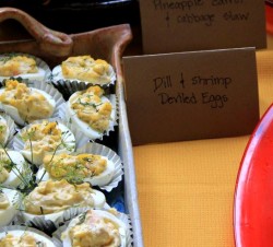 photo of a clay tray with deviled eggs on it