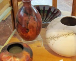 photo of pots and vases on a shelf