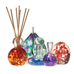 photo of muliple arranged blown glass vases