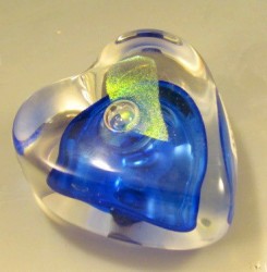 photo of a blue and green blown glass heart