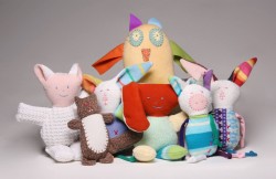 photo of knit stuffed animals sitting together