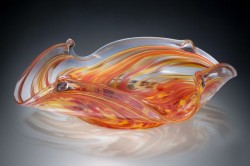 photo of an orange blown glass bowl