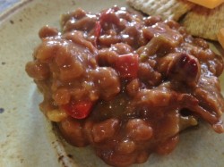 close up photo of baked beans on a plate
