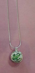 photo of a green pendent necklace