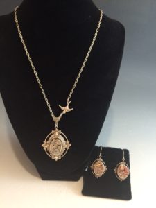 Necklace and earrings with clock parts