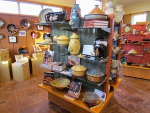 Clay Coyote Gallery carries handmade pottery made onsite every day including vinegar crocks, bread bakers, trays, cassoles, and our line of Clay Coyote Flameware cookware (skillets, saucepans, and tagines)