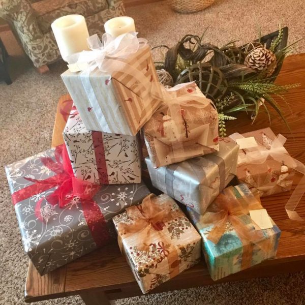photo of wrapped presents sitting on a coffee table