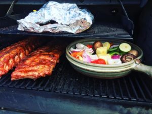 Minnesota ribs with flameware grill basket full of veggies 