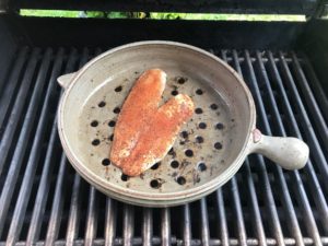 Fish tacos in a clay coyote grill basket 