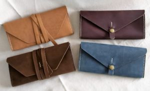 Patrick Callery from Clurichaun Workshop leather clutches