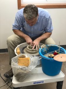 phil throwing a chicken baker