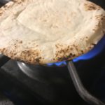 Tortilla on warming on the stove