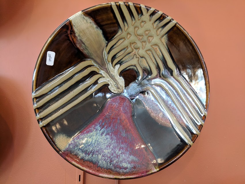 A Matthew Patton plate hanging on the wall