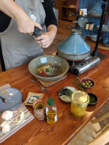 Morgan prepping spices for chicken tagine