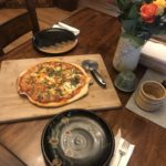 Dinner is serves, clay coyote dinner ware with pizza made on a flameware pizza stone