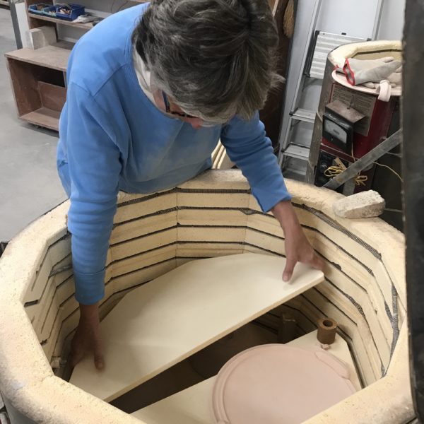 Betsy Price unloading the kiln