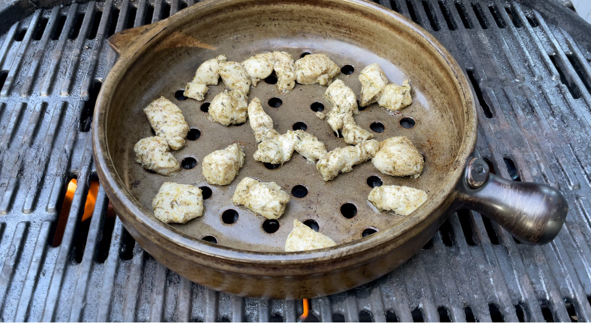 Clay Coyote Grill Basket with Greek Chicken in Action on a Weber Grill