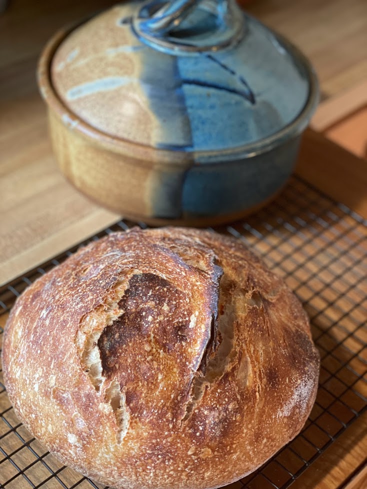 https://www.claycoyote.com/wp-content/uploads/2021/11/bread-in-front-of-bread-baker.jpg