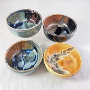 Four Clay Coyote Microwave Omelette Cookers in a variety of glazes