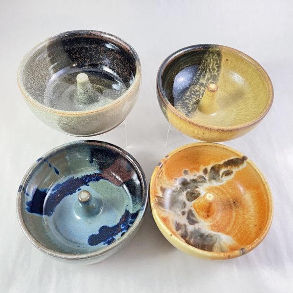Four Clay Coyote Microwave Omelette Cookers in a variety of glazes