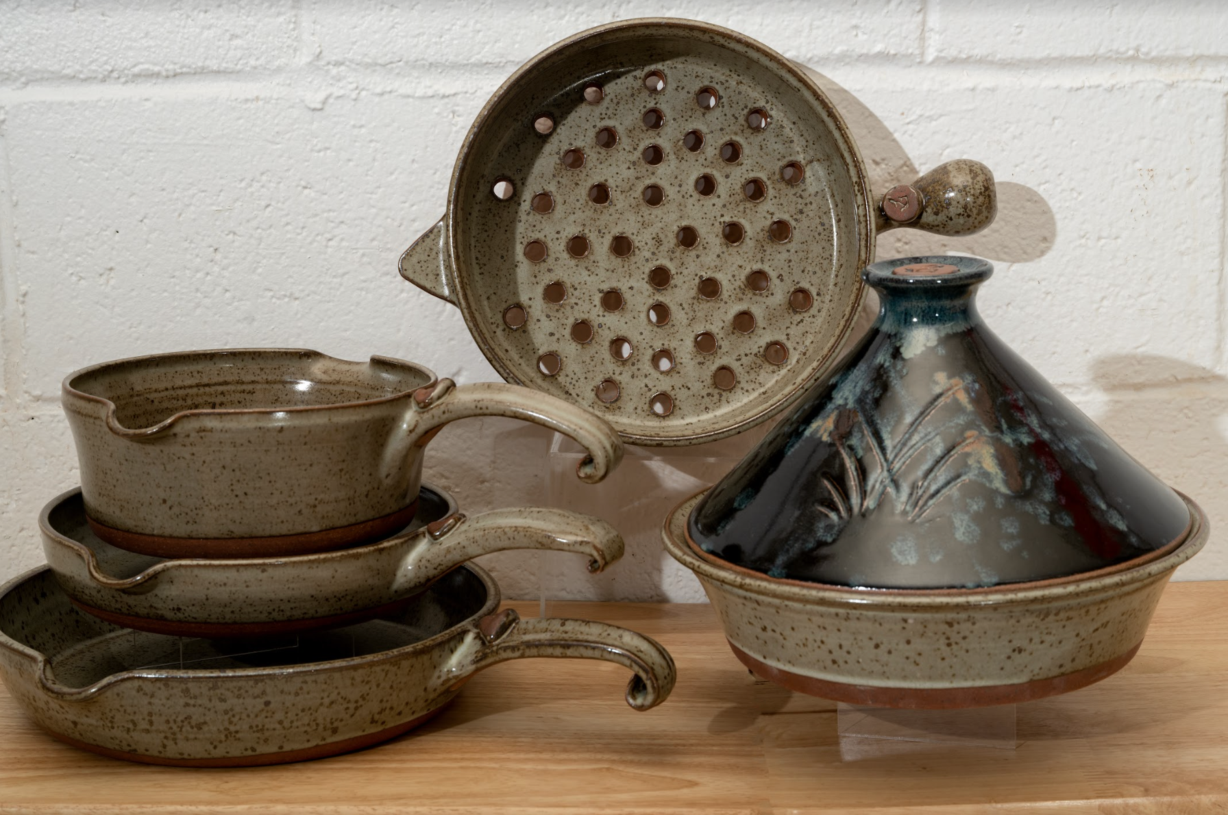 https://www.claycoyote.com/wp-content/uploads/2022/08/Clay-Coyote-Flameware-5-peice-set-with-Midnight-Garden-Tagine.png