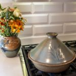 Clay Coyote Tagine in Mediterranean Blue on a stovetop